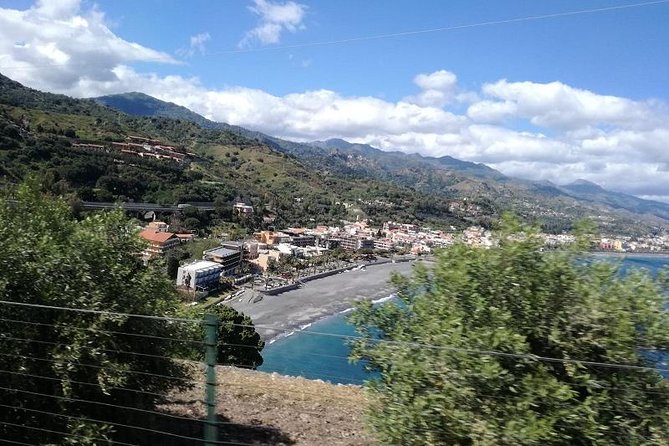 'The Godfather' Movie Tour from Taormina - Coach time and hearing the guide on a busy afternoon